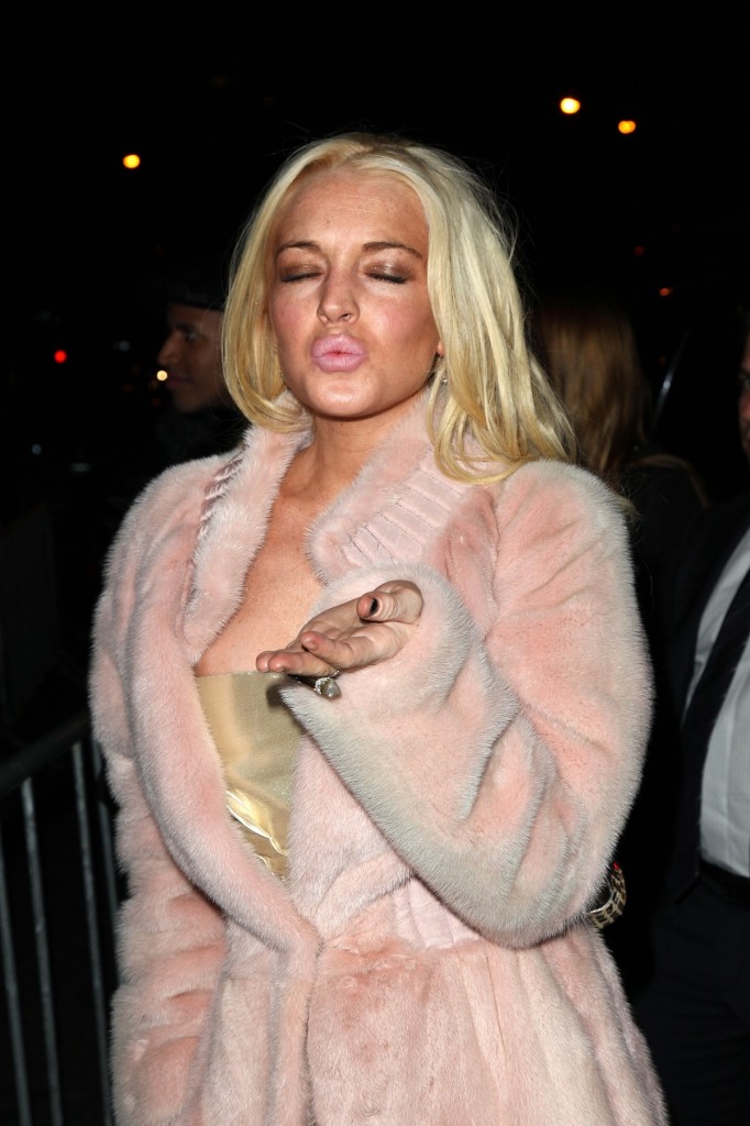 Lindsay Lohan slips a nip. The last of the Andrews Sisters blows a kiss to 